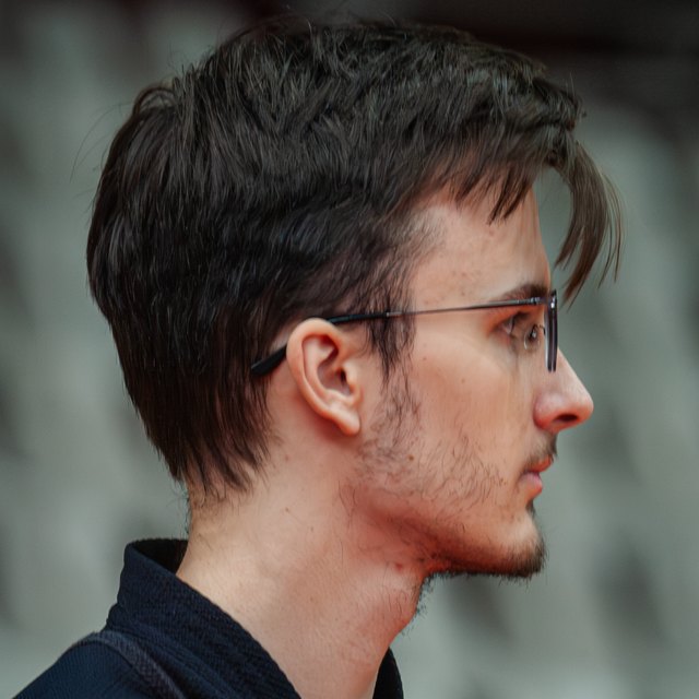 Maksim B. in profile in his kendo uniform