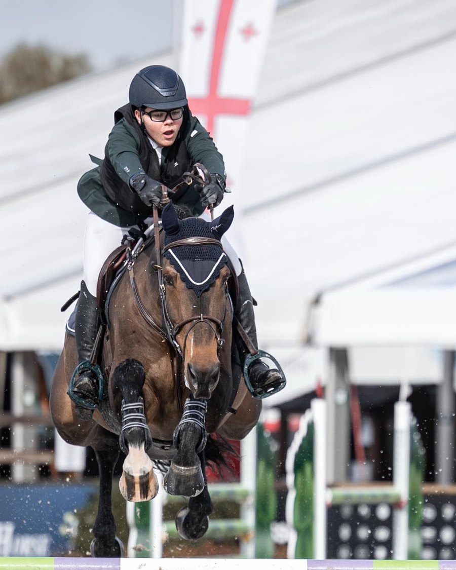 Peter G., an IGCSE student and show jumper, on his horse