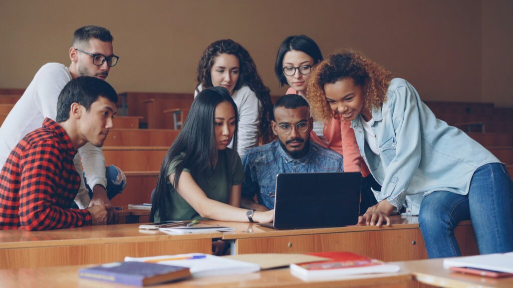 IGCSE students learning together on a laptop — IWS Online School