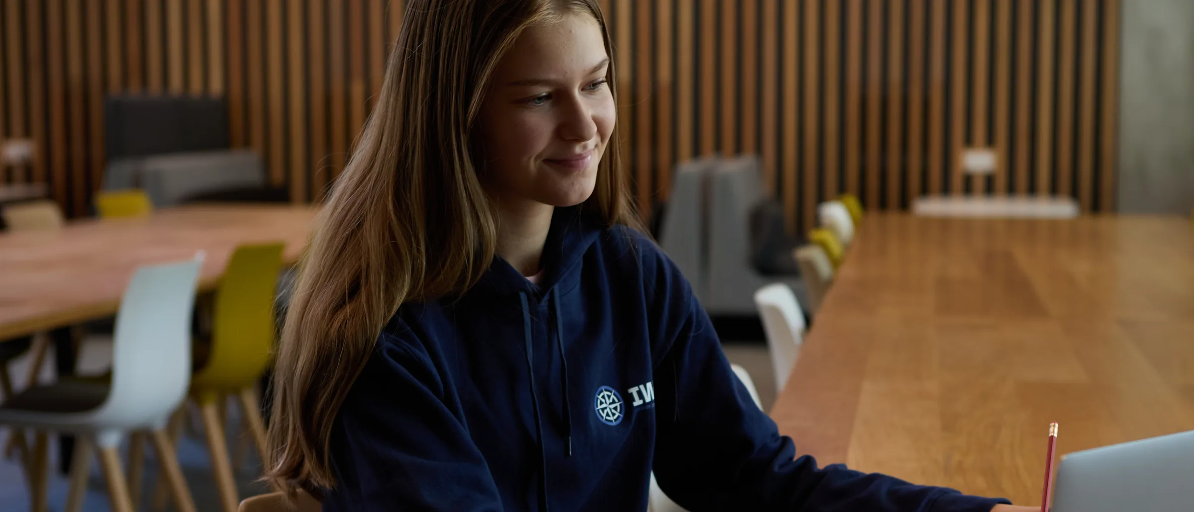 An IWS student working in the study room