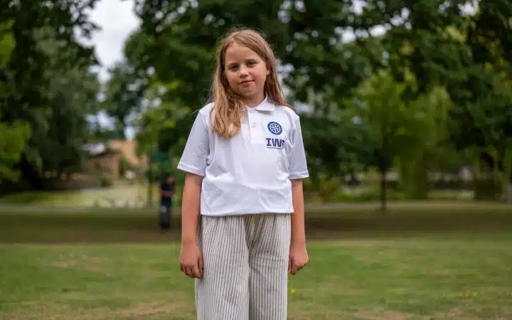 A younger IWS student at work