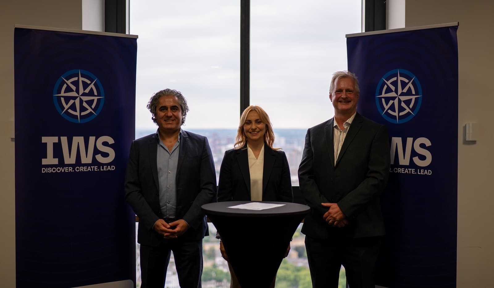 IWS Online School leadership and new shareholders at the investment announcement in London